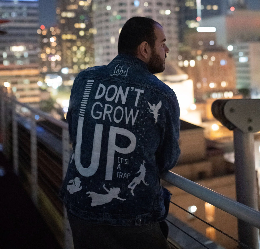 DON'T GROW UP, IT'S A TRAP HAND-PAINTED UNISEX DENIM JACKET