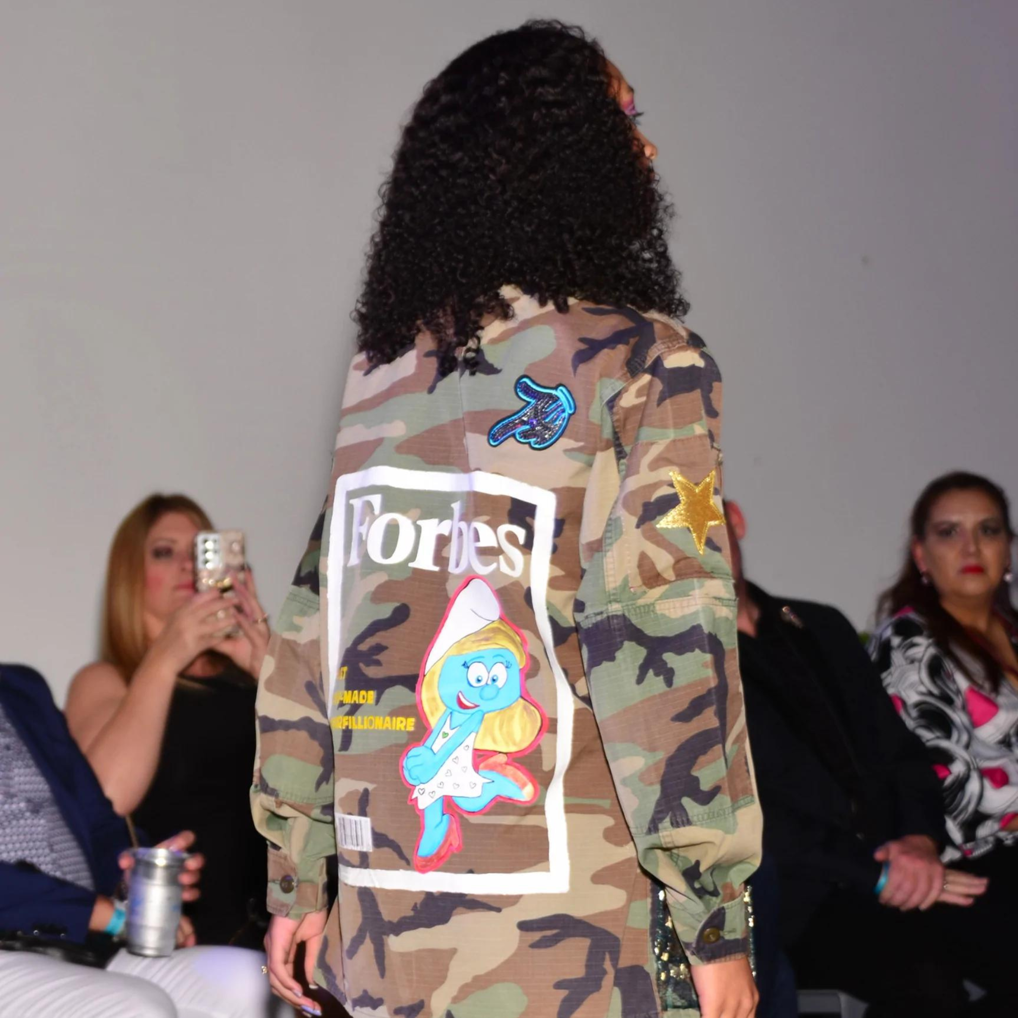 Camo jacket with sales writing on back